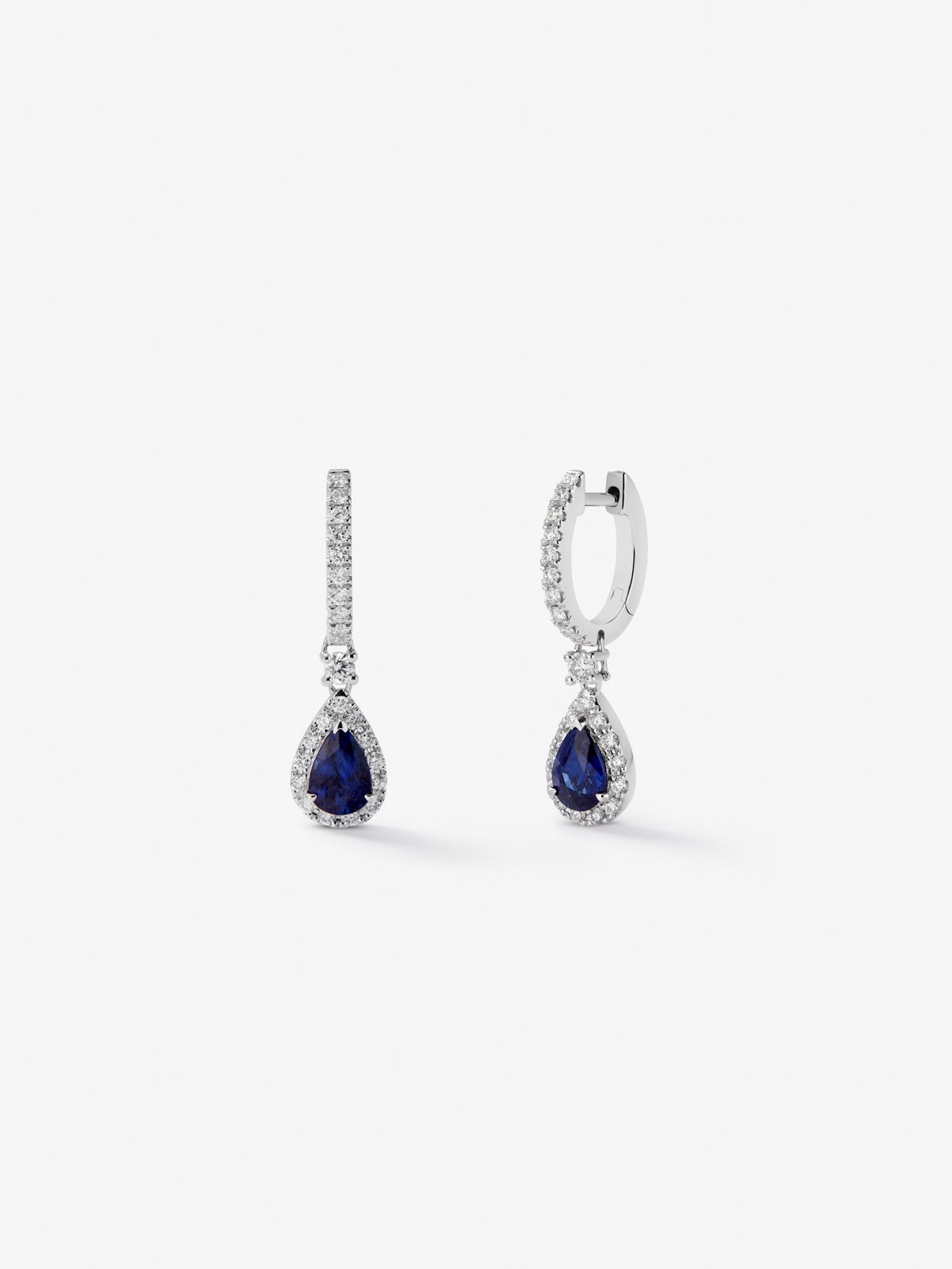 18K white gold earrings with 2 pear-cut blue sapphires with a total of 1.29 cts and 48 brilliant-cut diamonds with a total of 0.51 cts