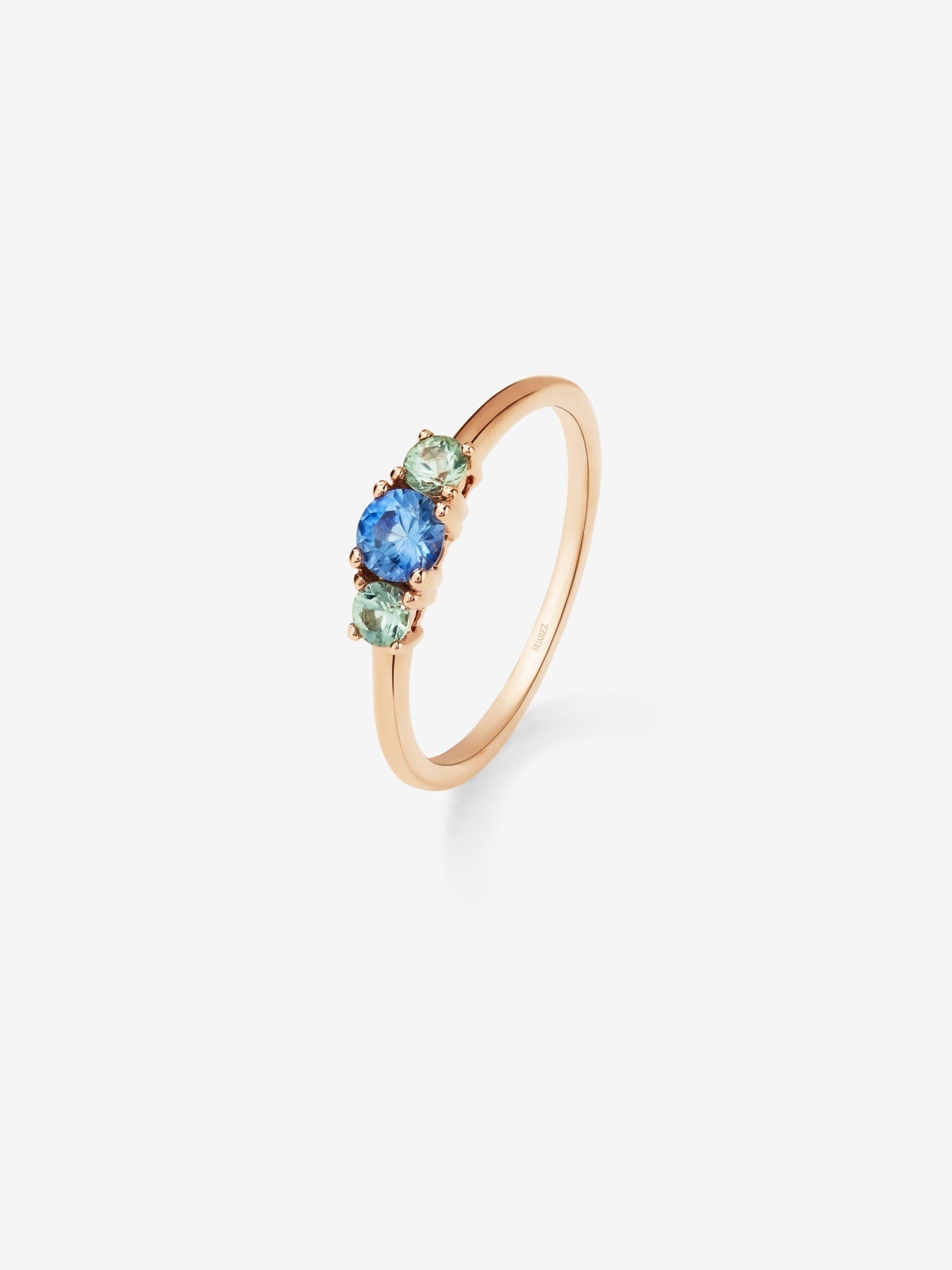 18K rose gold triple ring with blue sapphire and 2 green sapphires in brilliant cut with a total of 0.55 cts