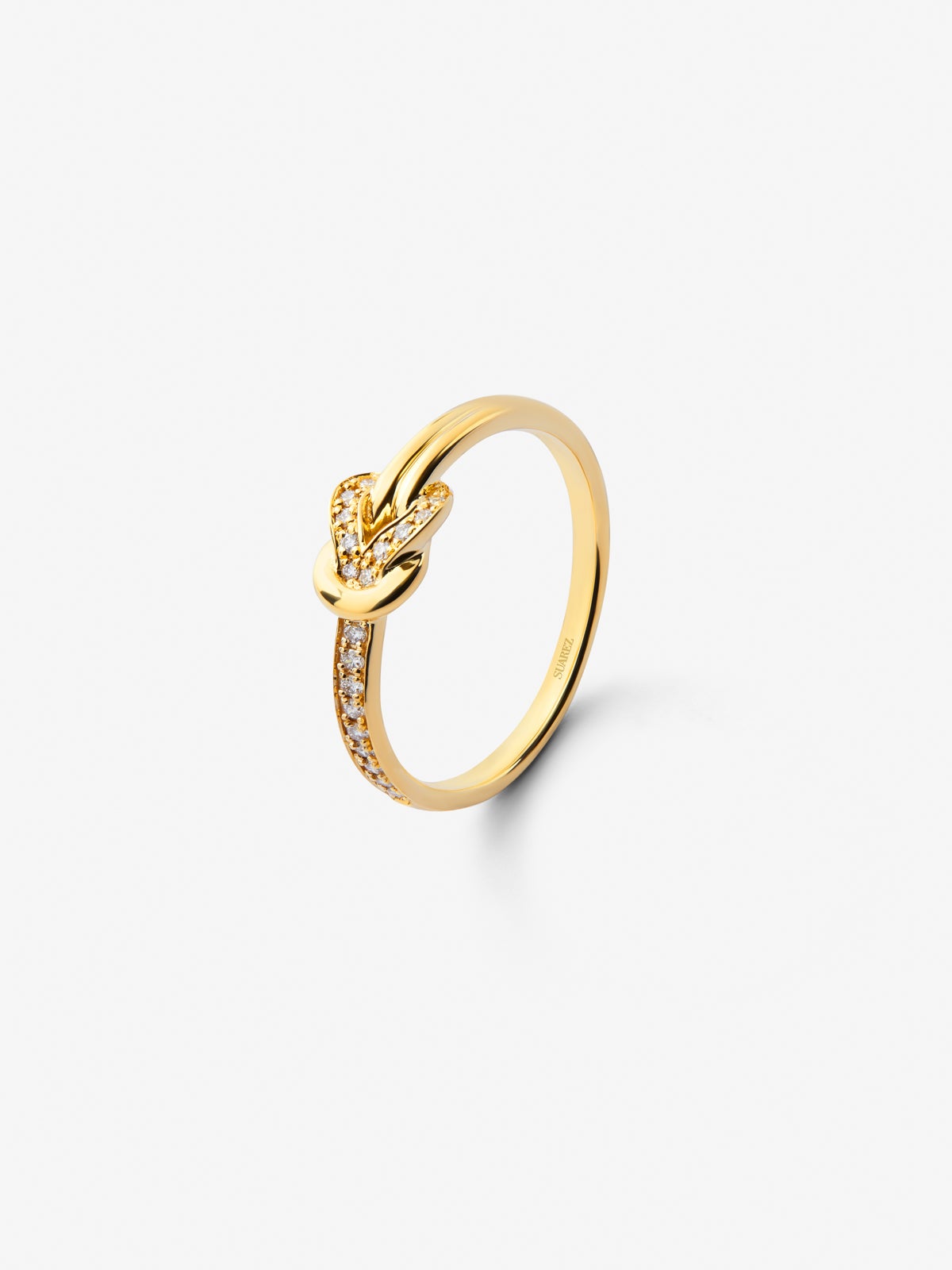 18K yellow gold ring with 15 brilliant-cut diamonds with a total of 0.09 cts and a knot shape