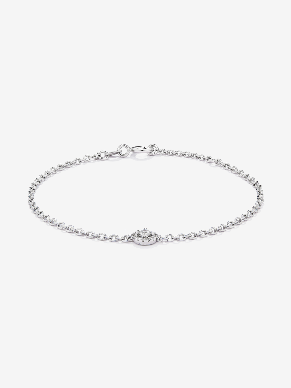 18K white gold chain bracelet with solitary diamond and diamond halo.