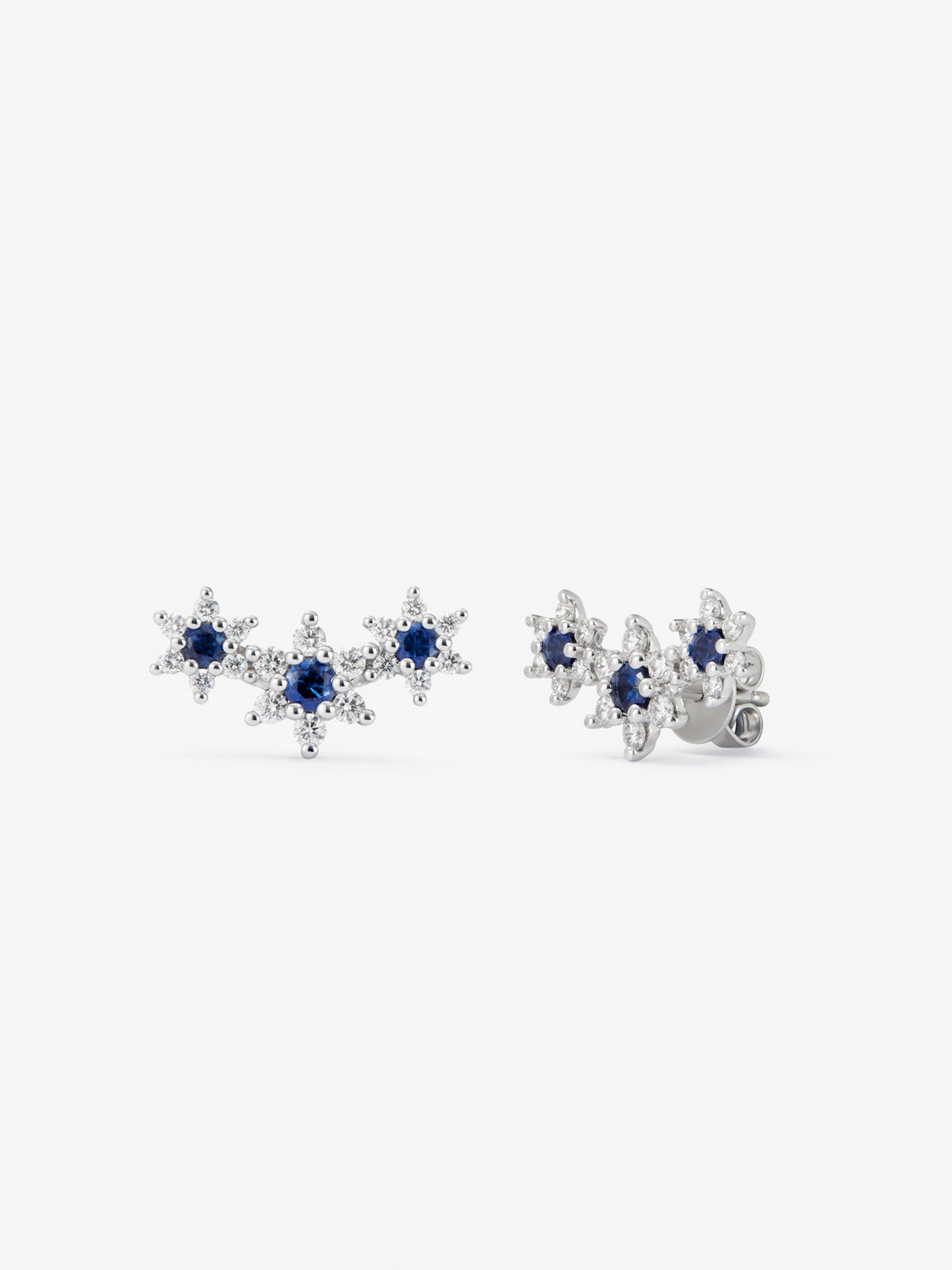 18K white gold climbing earrings with 0.75 ct brilliant-cut diamonds and 0.61 ct brilliant-cut blue sapphires