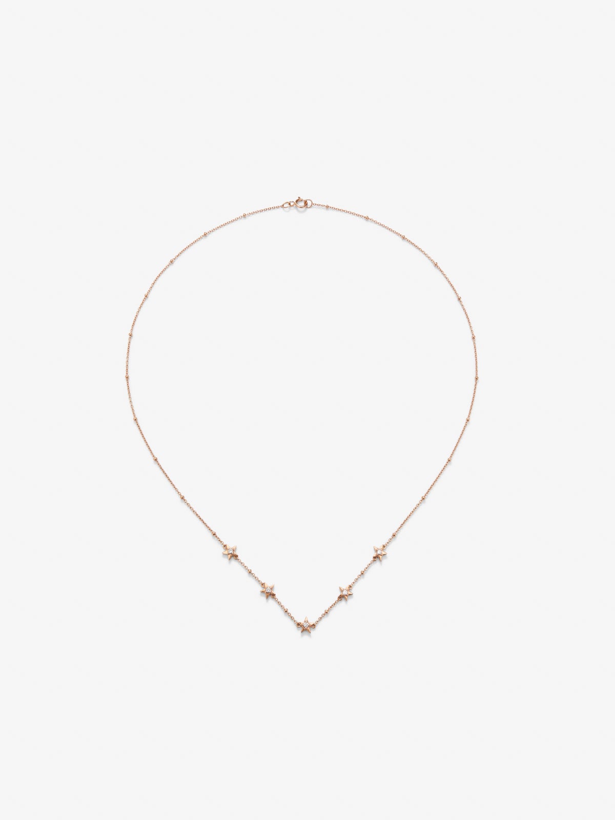 18kt Rose gold star pendant with diamonds