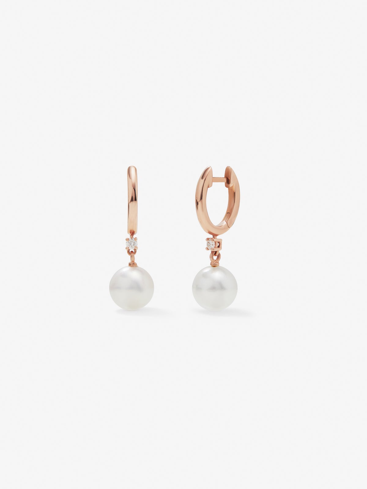 18K rose gold earrings with 2 brilliant-cut diamonds with a total of 0.07 cts and 2 8.5mm Australian pearls