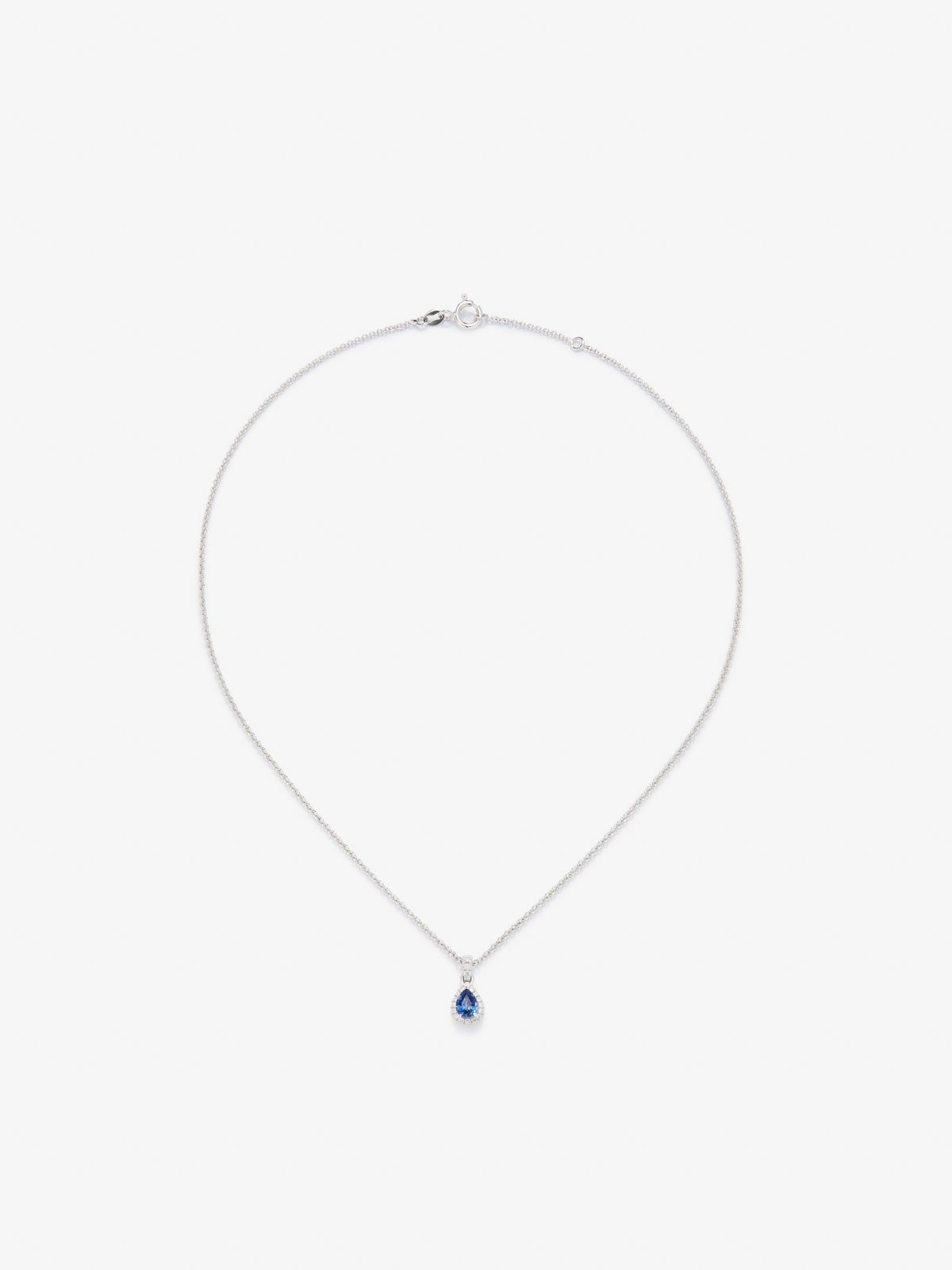 18K white gold pendant with blue zafiro in 0.4 cts and white diamonds in bright 0.08 cts