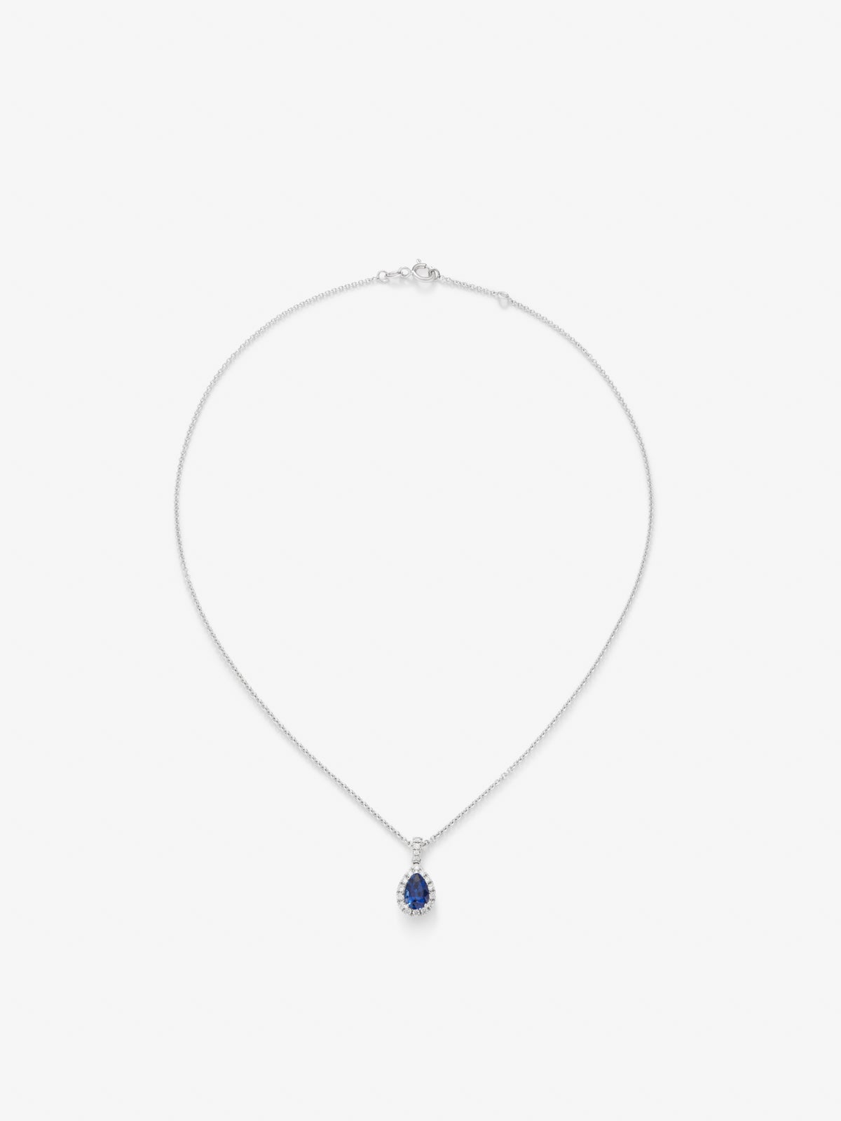 18K white gold pendant with pear-cut blue sapphire of 1.17 cts and 18 brilliant-cut diamonds with a total of 0.19 cts